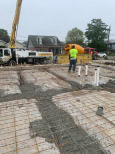 People laying cement