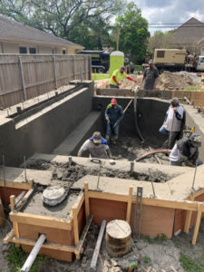 construction workers building new foundation