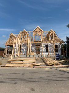 large two story home being built