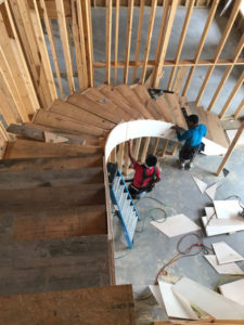 construction workers inside new home