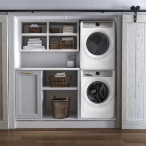 laundry room with stacked washer and dryer